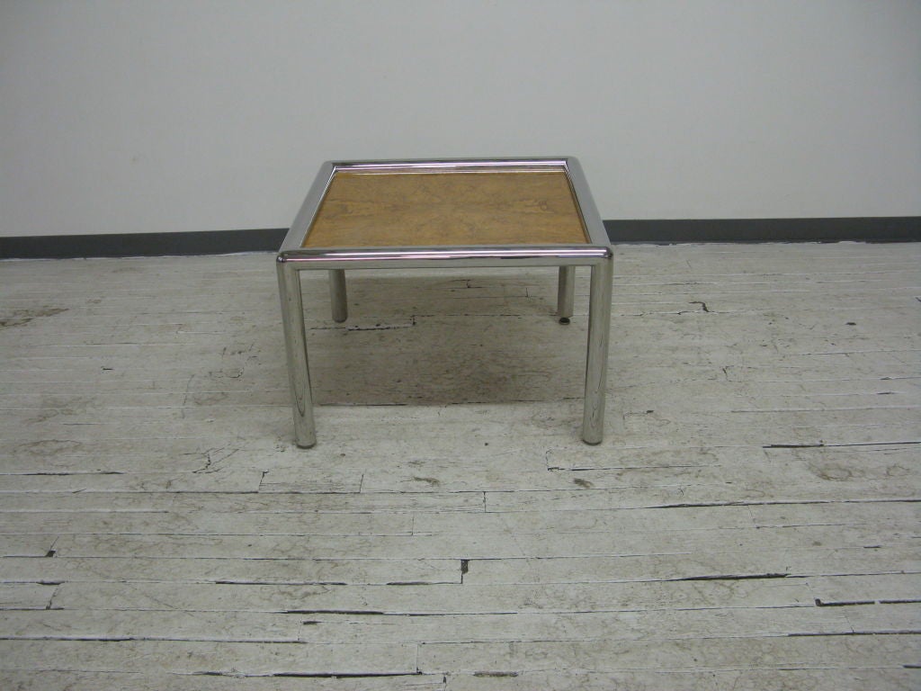 Chrome cocktail table with burl top,and adjustable glides feet attributed to John Mascheroni.