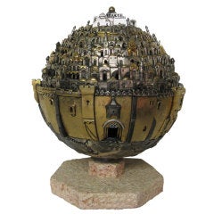 sculpture "La ville d'or" de Frank Meisler