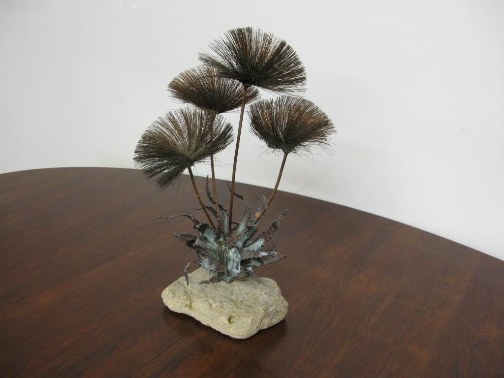 Decorative Jere style Brutalist desert flowers made of metal brass or copper sculpture with stone base, attributed to artist John Steck.