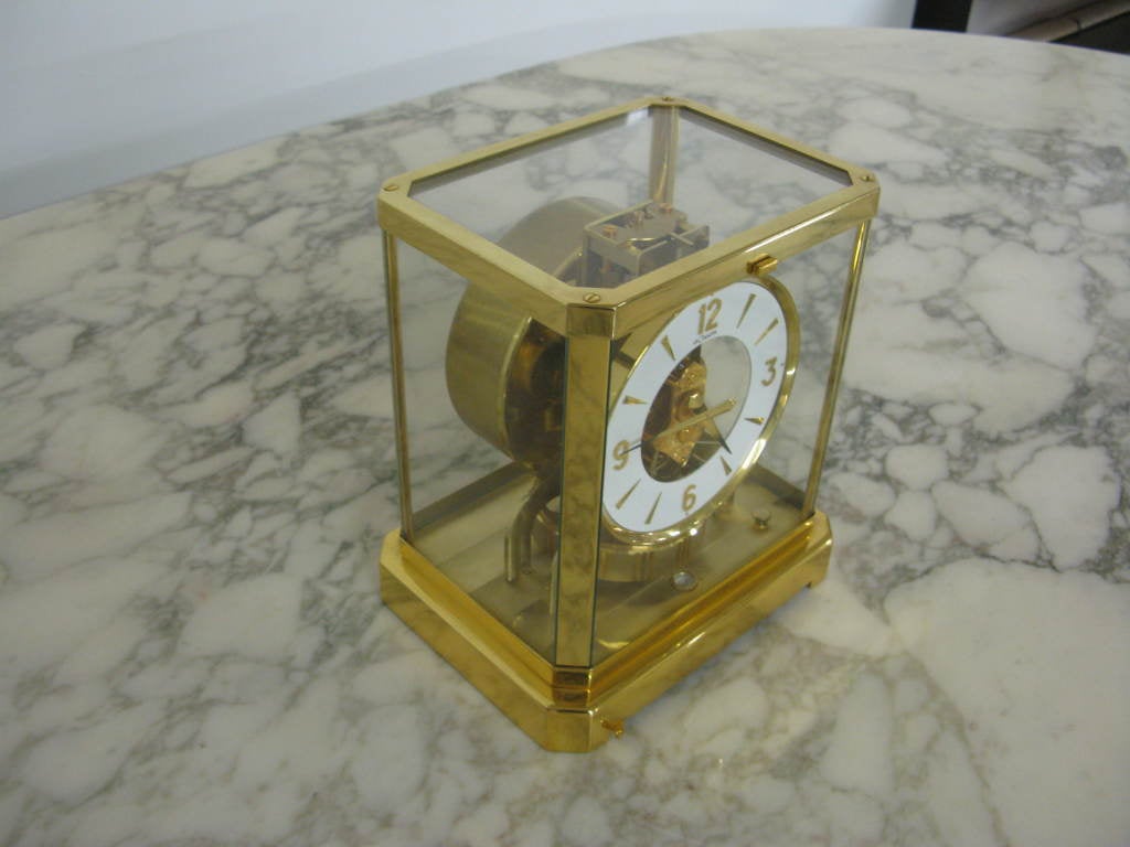 Jaeger Le Coultre Atmos perpetual motion clock.No winding ever.Runs silently,accurately powered by temperature changes alone,with 3 pieces of original paper work.