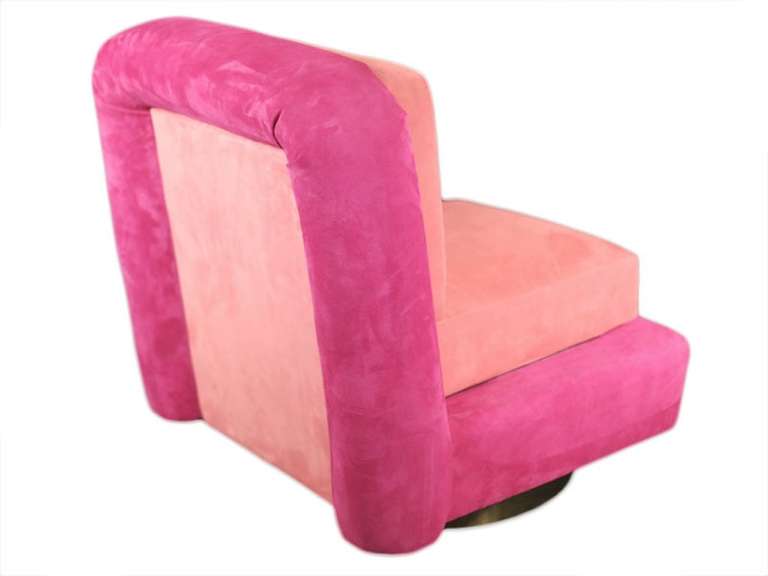 Original 1970's swivel chair that has been reupholstered in flashy pink cow hides, creating a bold disco statement! The chair swivels at 360 degrees. 

As with all voila! Studio creations, this item is entirely customizable.
