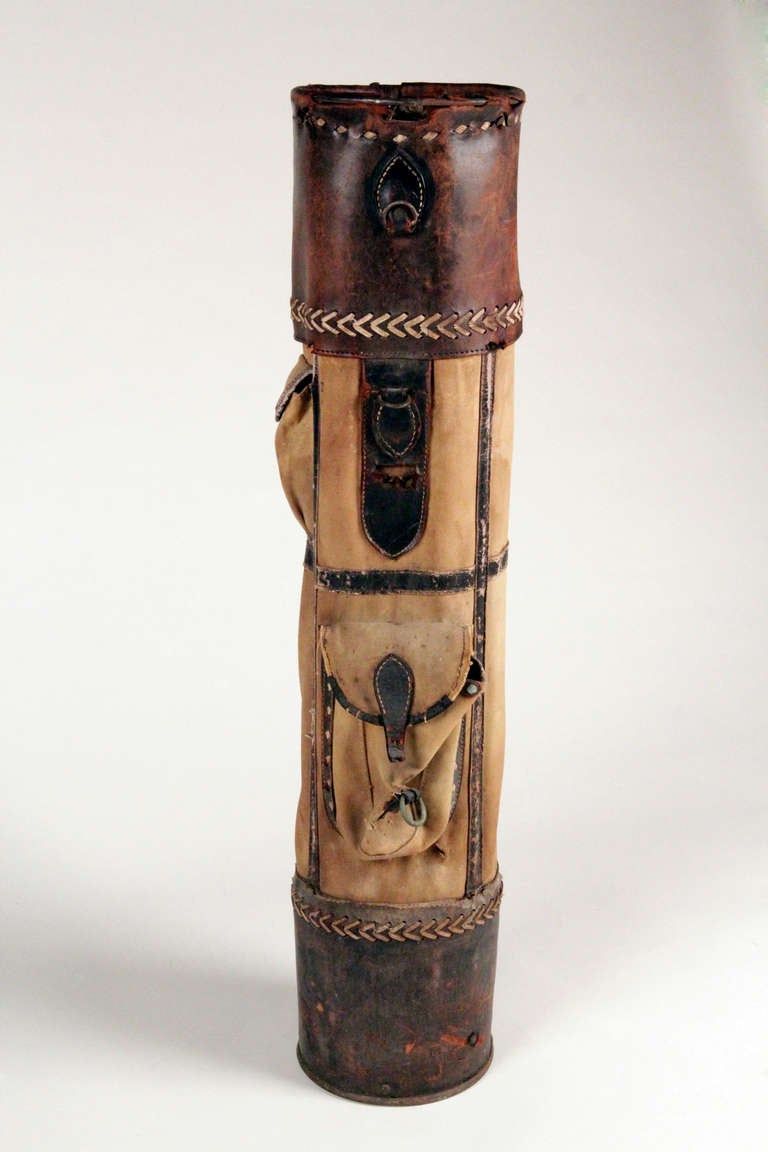 This is a fantastic antique golf bag composed of original canvas, leather, and metal base and frame. It originates from the R.H. Buhrke Co. in Chicago, USA. The piece has two canvased pockets for golf balls and tees. It will provide an excellent