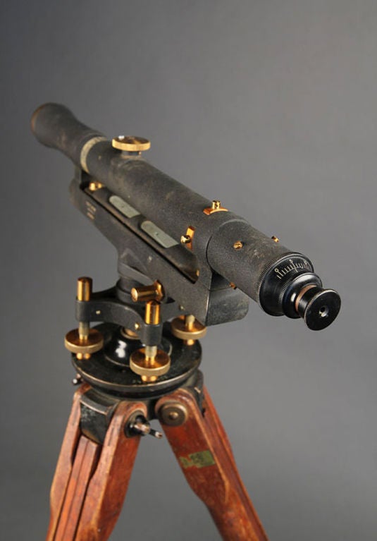 This rare find dates back to the early twentieth century when it was produced by Eugene Dietzgen Co. This decorative object was renown for its stability, powerful telescope and sensitive bubble. Today, it would make a statement in any room. The