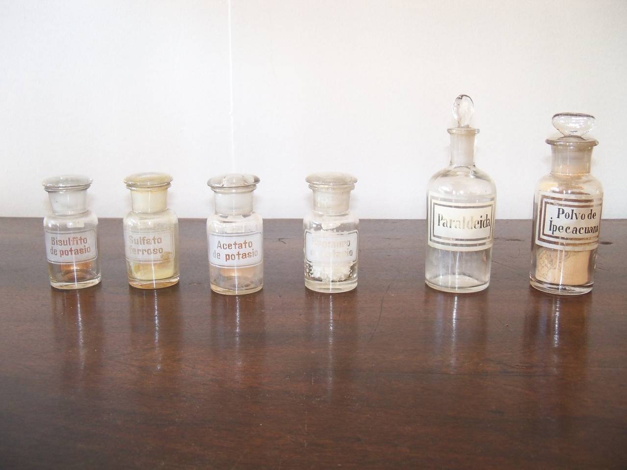 Glass Collection of German and South American Apothecary Bottles, Early 20th Century For Sale