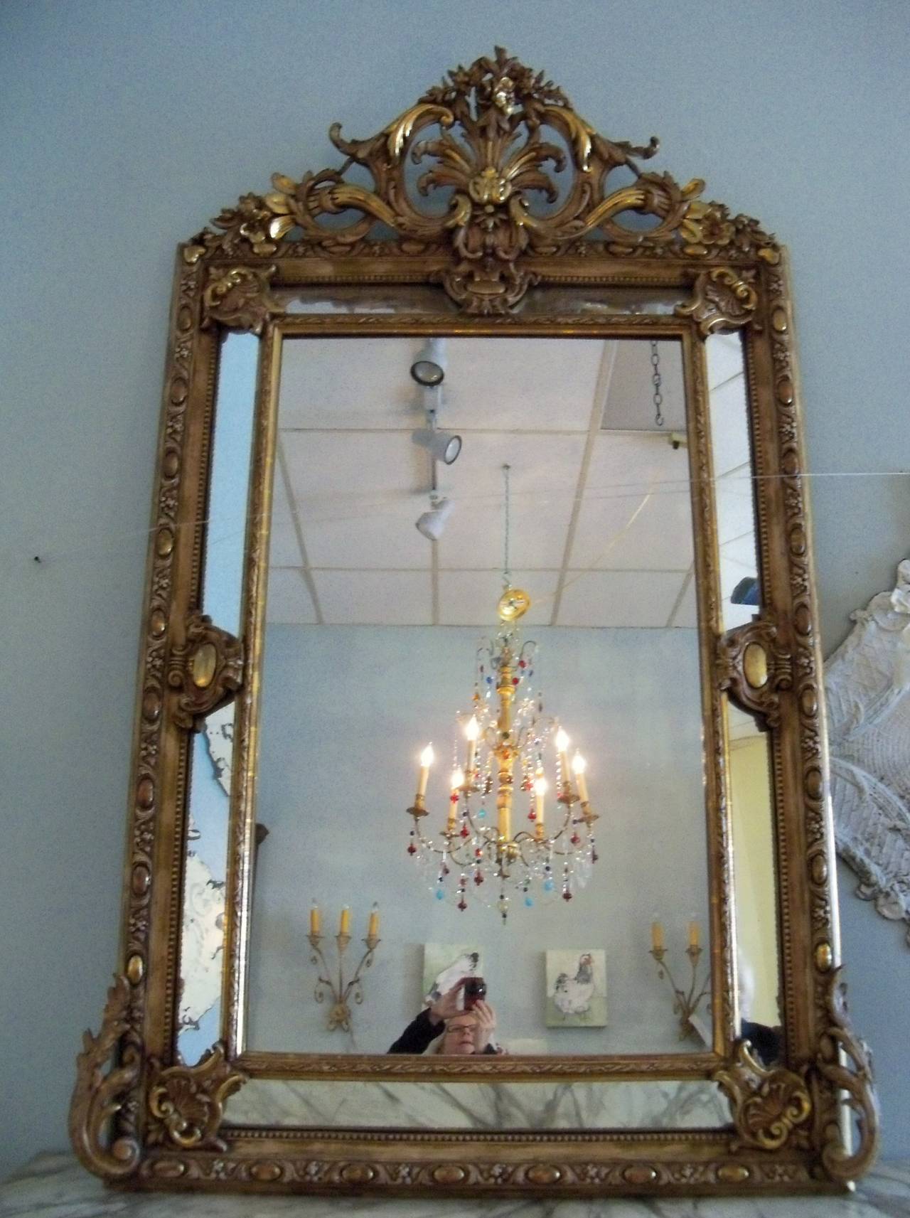 Large Richly Ornamented Giltwood and Paint Pierced Crested French Mirror