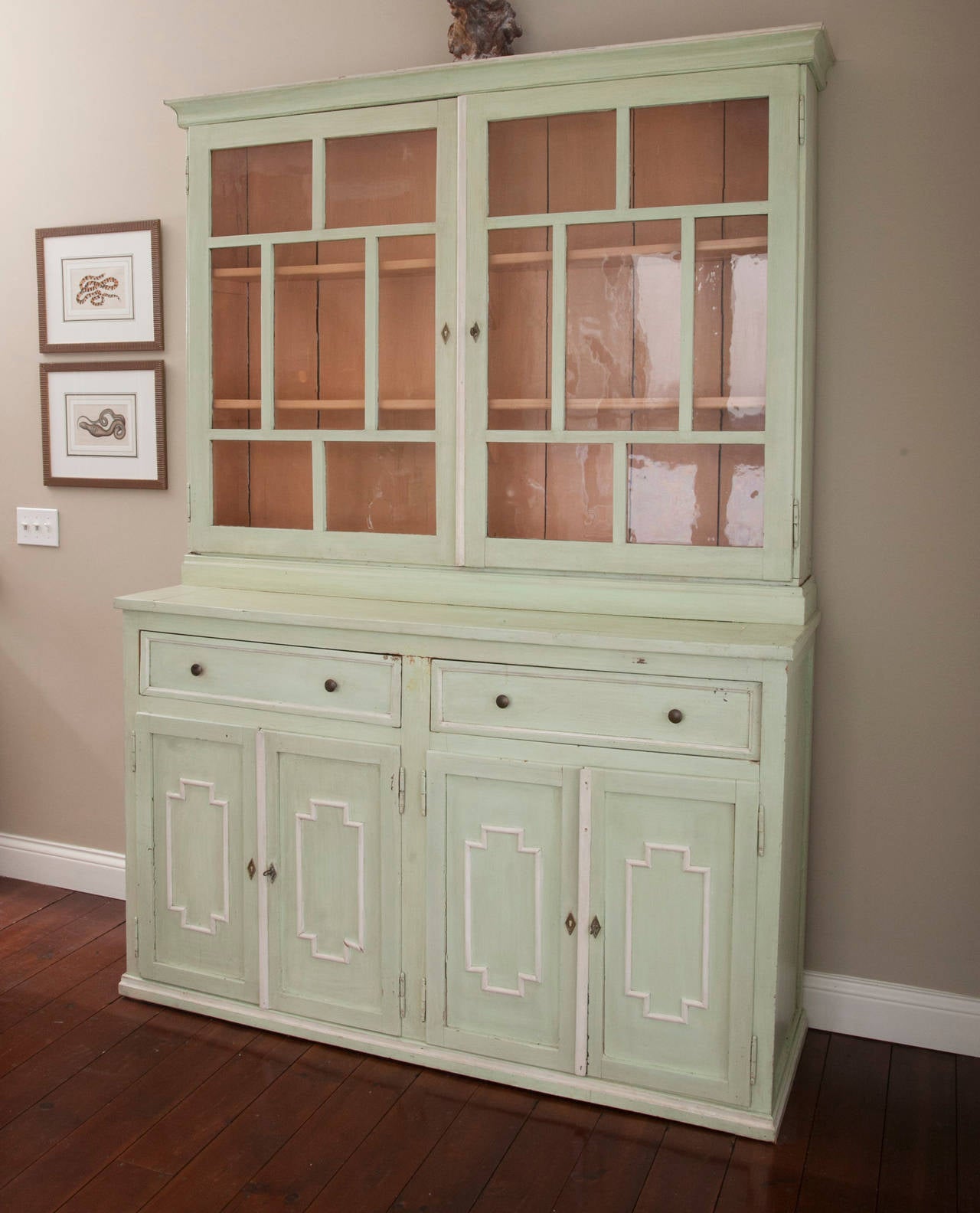 Wonderful Pale Green-Painted Cabinet, Typical South of France circa 19th c, with Double Top Doors Featuring Original Glass Atop Base with Two Drawers and Four Decorative Panelled Cupboard Doors.  Base Height is 40.25"; Overall Height is