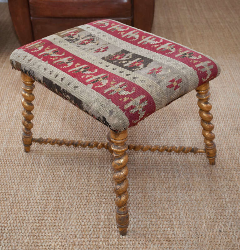 Gilt Wood Bench, circa 19th century France, with Twist Leg and Cross Stretcher in Persian Cross Stitch Upholstery