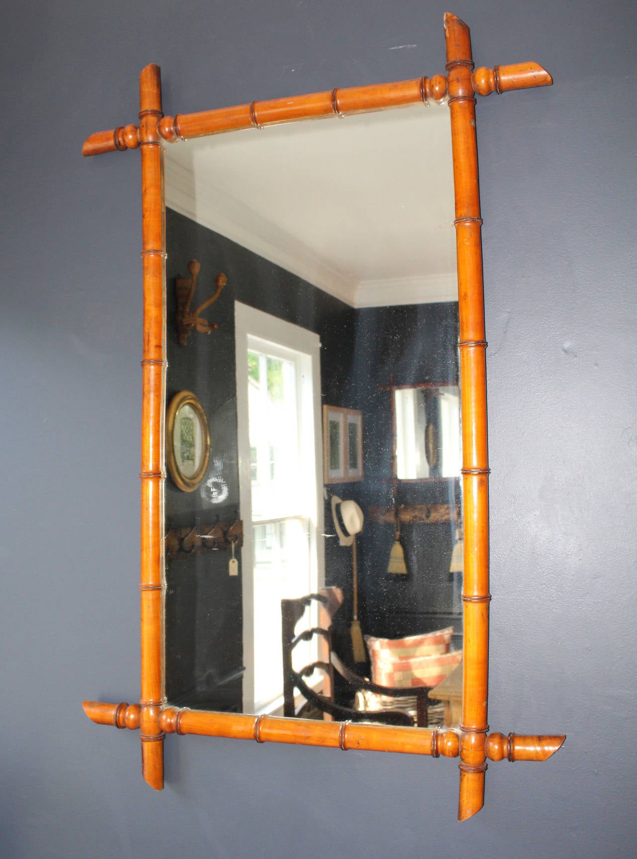 Late 20th century France faux bamboo mirror. Additional faux bamboo mirrors available. Please call for measurements and pricing.