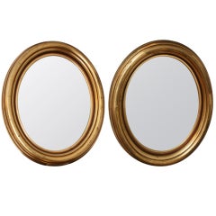 Pair of Oval Gilt Framed Mirrors