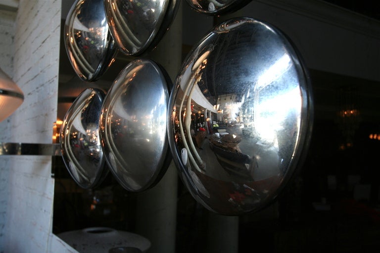 1970s Hub CAP sculpture made of Lucite and steel. Measures: Hub caps are 10.5