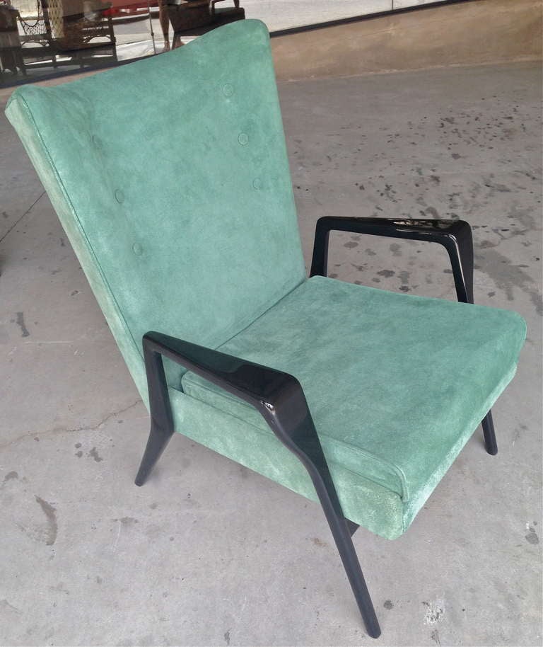 Pair of Scapinelli armchairs with ebonized wood and upholstered in green suede.