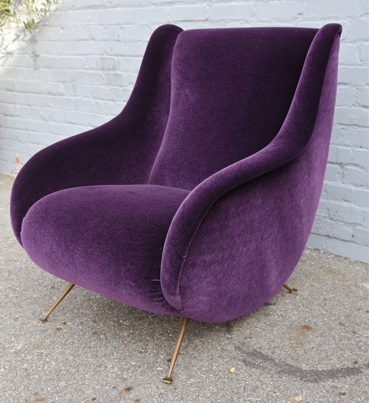 Italian armchair from the 1960s upholstered in purple/aubergine mohair with brass legs.