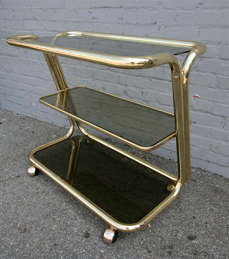 Three-Tiered 1970s Brass Bar Cart with Smoked Glass Shelves In Good Condition In Los Angeles, CA