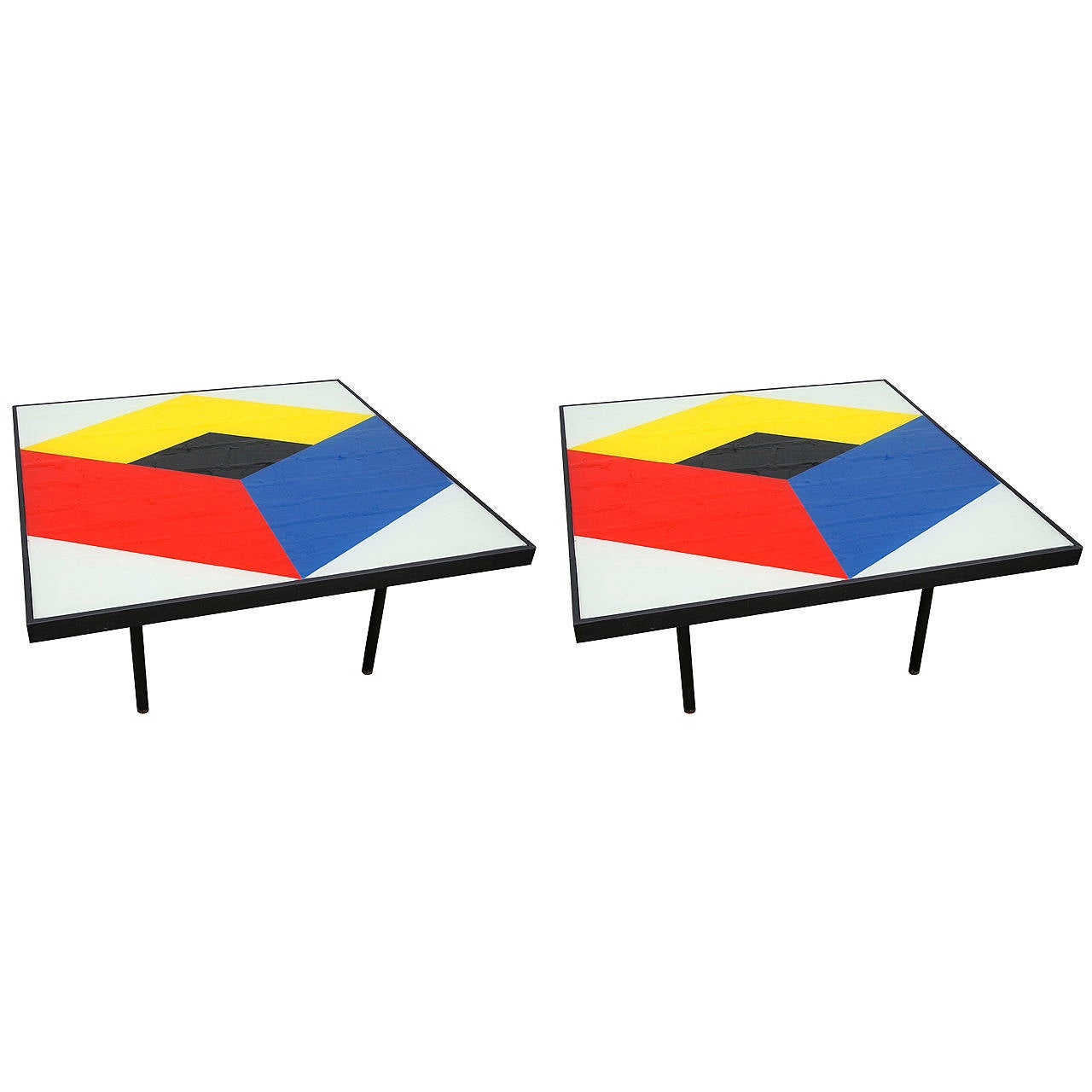Pair of 1960s reverse painted glass coffee tables with colorful, geometric design in blue read and yellow.