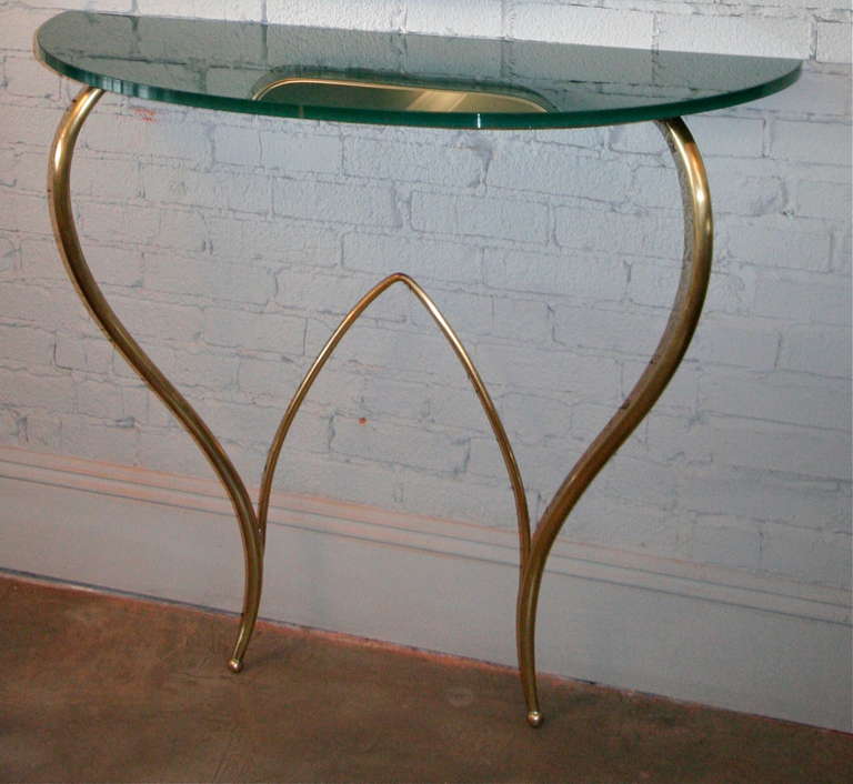 Italian glass and brass console.