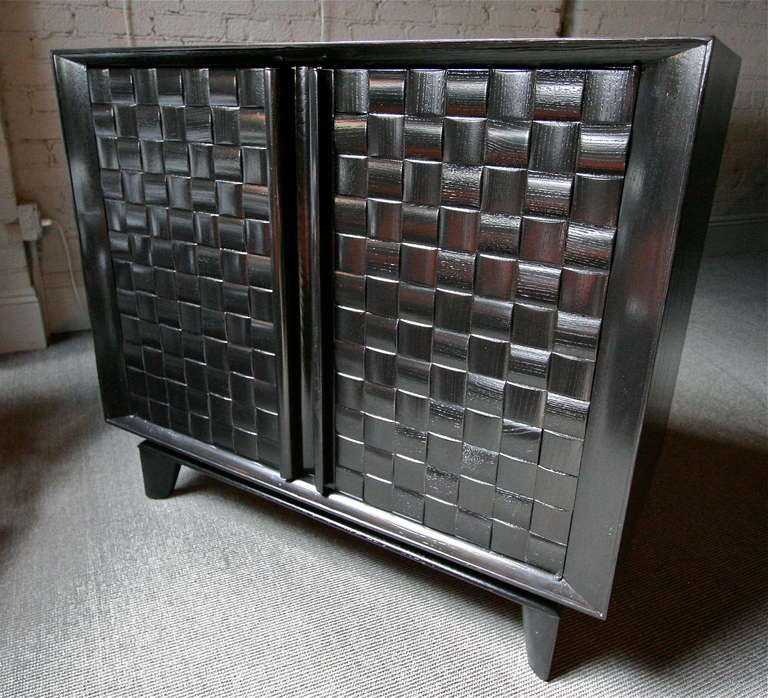 Ebonized basket weave cabinet by Paul Laszlo for Brown Saltman.  Matching glass display case available.

Please call or use the contact dealer link below to reach us directly with any questions regarding this item. We are happy to obtain delivery
