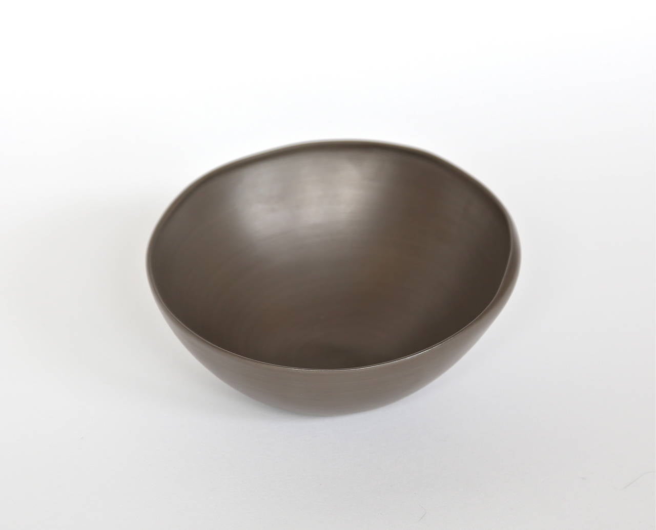 Italian handmade ceramic bowls in dark bronze, light and dark mauve by Rina Menardi. Can be ordered in many colors. Note: Light & dark mauve no longer available. Priced individually. Made to order. Shipping from Europe not included.

Measures: Mini: