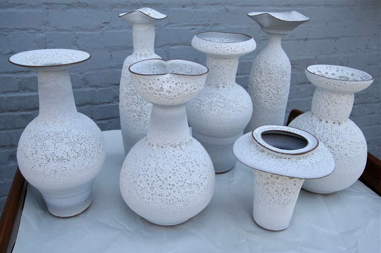 Set of 13 ceramic vases by artist Jeremy Briddell.  Vases are made with a unique technique and are glazed on the inside.  Priced individually.

Please call or use the contact dealer link below to reach us directly with any questions regarding this