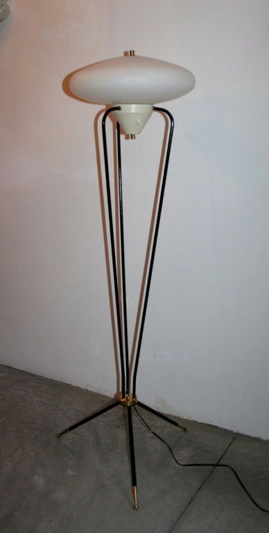 1960s Stilnovo metal and opaque glass floor lamp with one light.