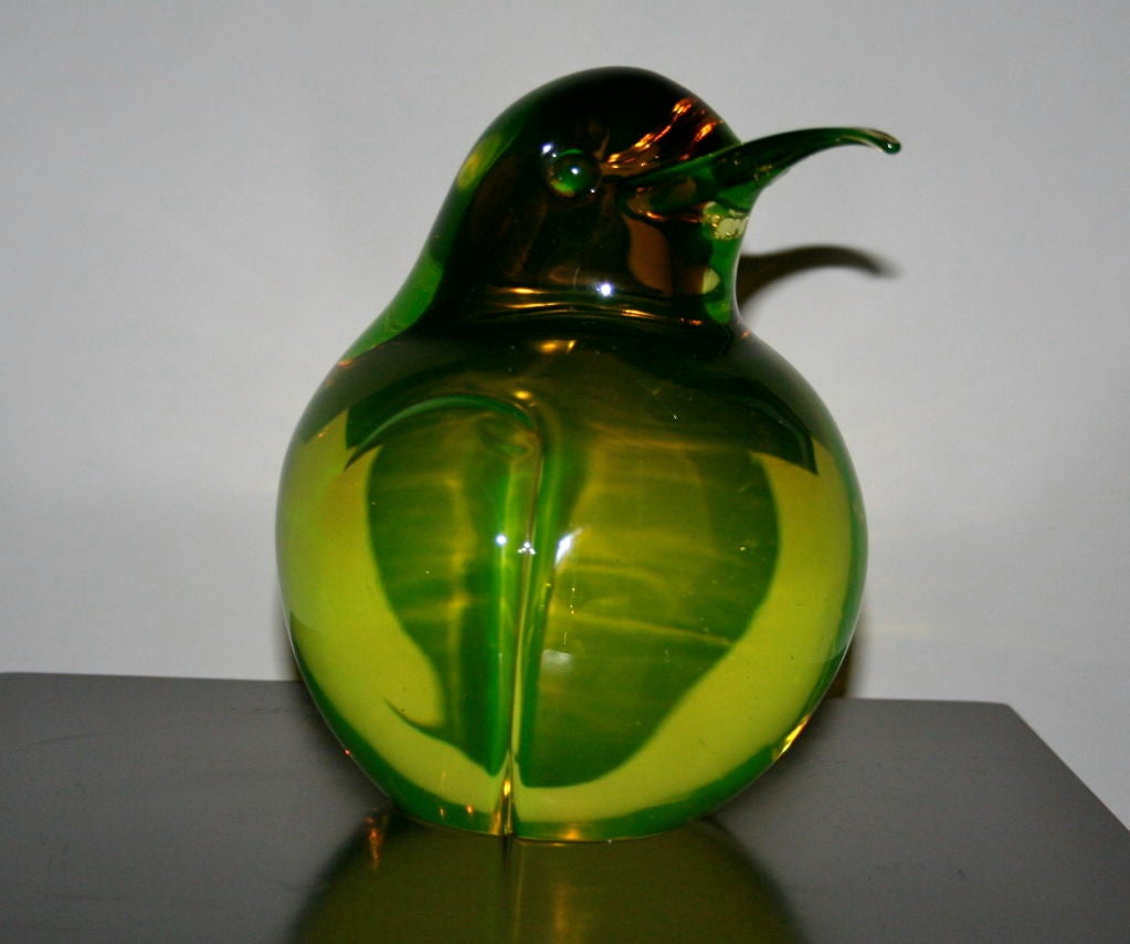 1960's vaseline glass bird in an exceptional combination of greens, very heavy.