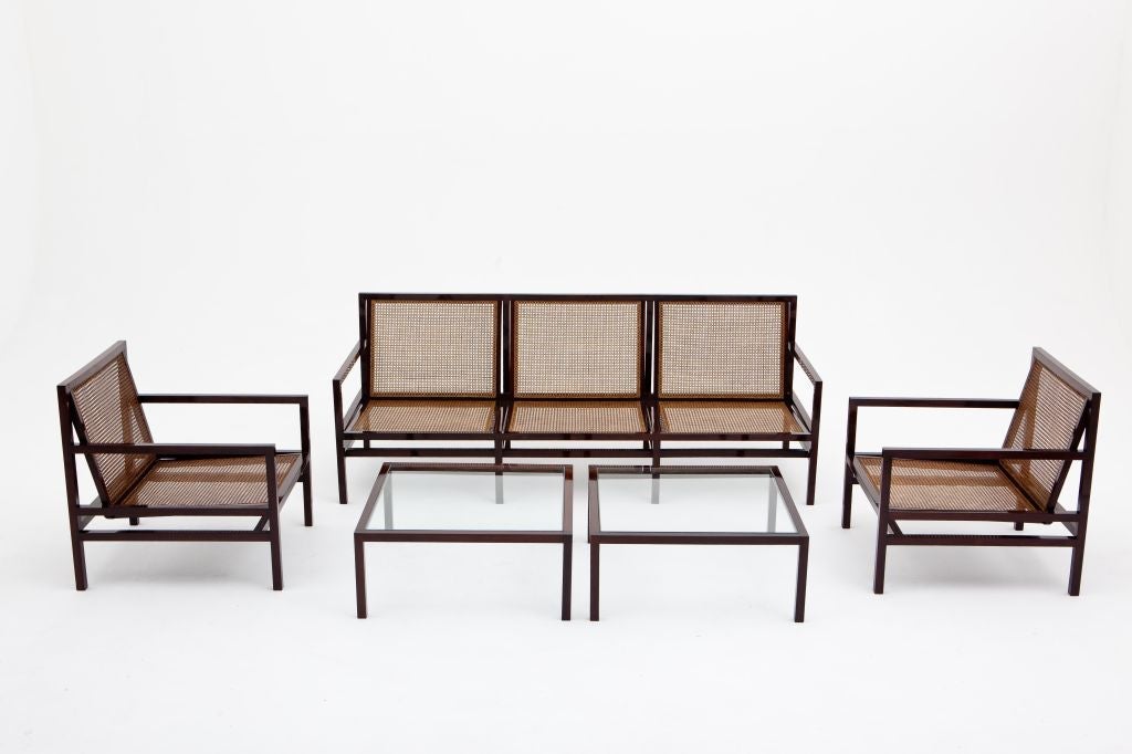 Amazing 60's jacaranda set by Joaquim Tenreiro consisting of a three-seat sofa, two armchairs, and two coffee tables. Impecable, masterfully restored. Presented on pg. 115 of the book TENREIRO, published by ICATU, Brazil. The dimensions of the sofa