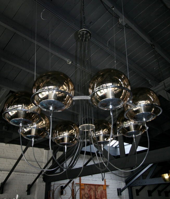 Pair of Large Raak Globe Chandeliers