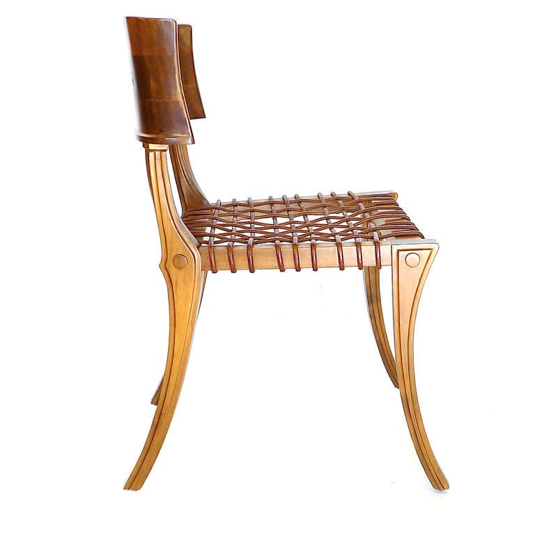 The design for these chairs is a true form of sculpture with beautiful carving details on the legs. Yet they are quite comfortable. It is the 1st issue of these chairs from 1961 produced in Greek walnut by Sardis of Athens. They are  in fantastic