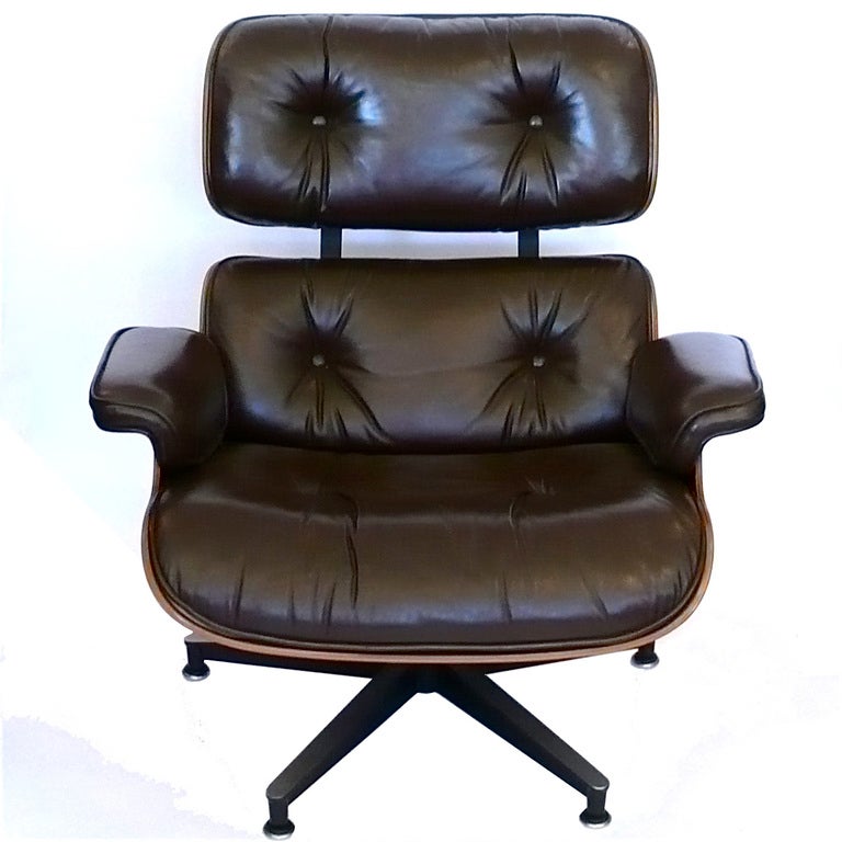 The condition of this original 1977 rosewood Eames chair and ottoman is amazing. The wood is beautifully patinated and beautifully grained. The leather is a rich deep brown, and is soft and scratch free. The chair swivels perfectly and is perfectly