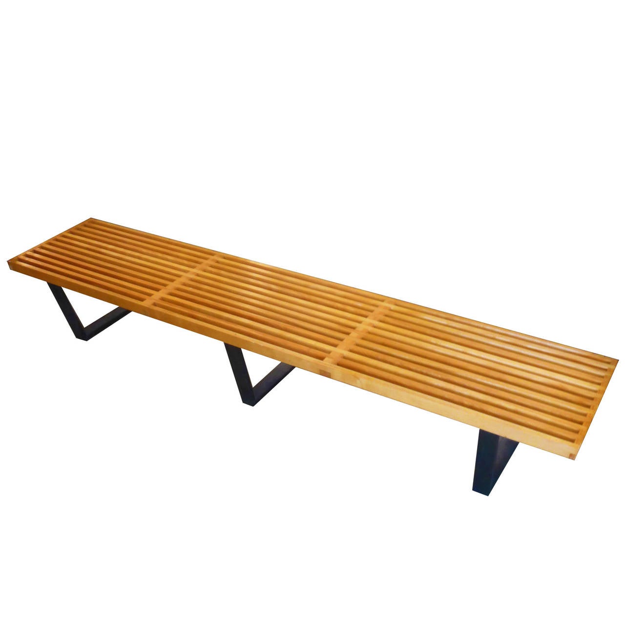 This is the second longest size that the Classic Nelson bench was made in. It is completely original with a great patina and barely any wear from age. It is strong and sturdy and extremely beautiful in this size.