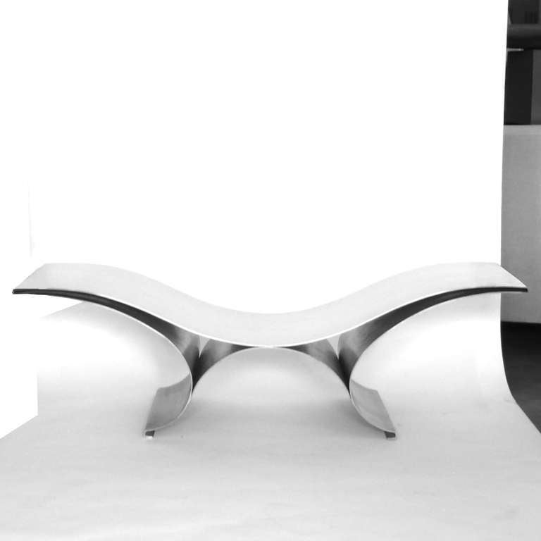 This iconic formed stainless steel sculptural bench was designed and produced by Maria Pergay in 1968.