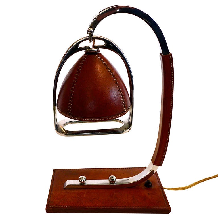 Beautiful stitched leather leather lamp from the 1950's by Longchamp. Nickel trimmed with warm original patinated leather. Fully functional.