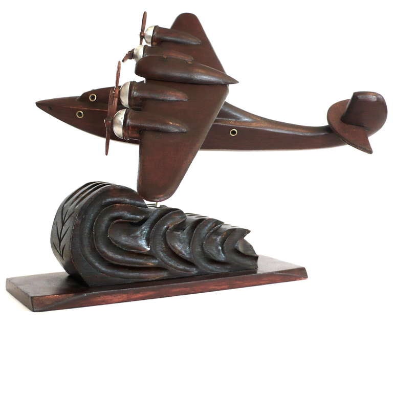 Great 1930s handmade airplane model crafted from wood with applied metal accents. Great desk accessory.