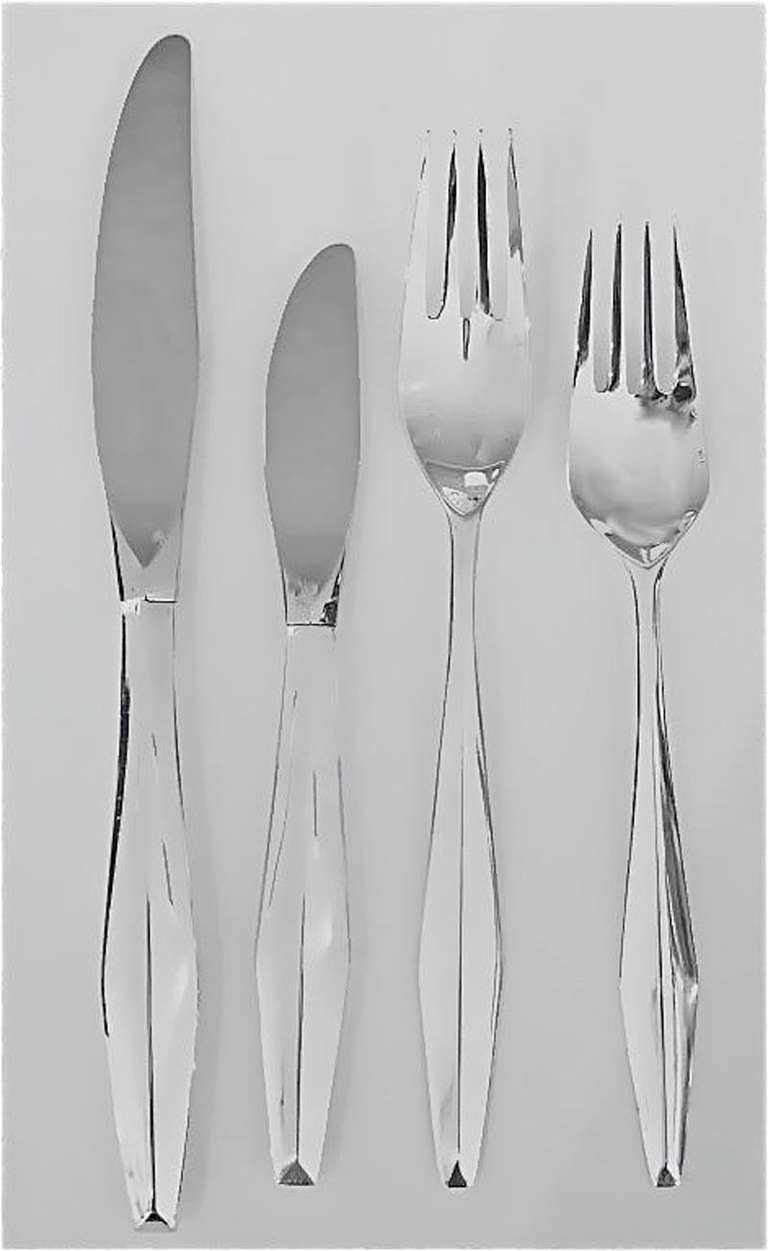This wonderful sterling silver flatware service was designed by Gio Ponti and produced by Reed and Barton in 1958. There is a complete seven piece table setting for twelve or if you prefer we have the matching pieces to increase it to a service for