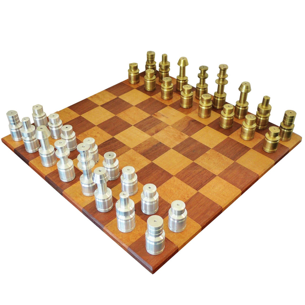 These machine age chessmen were made of solid aluminum and solid brass. They have a great minimalist design with strong detail.