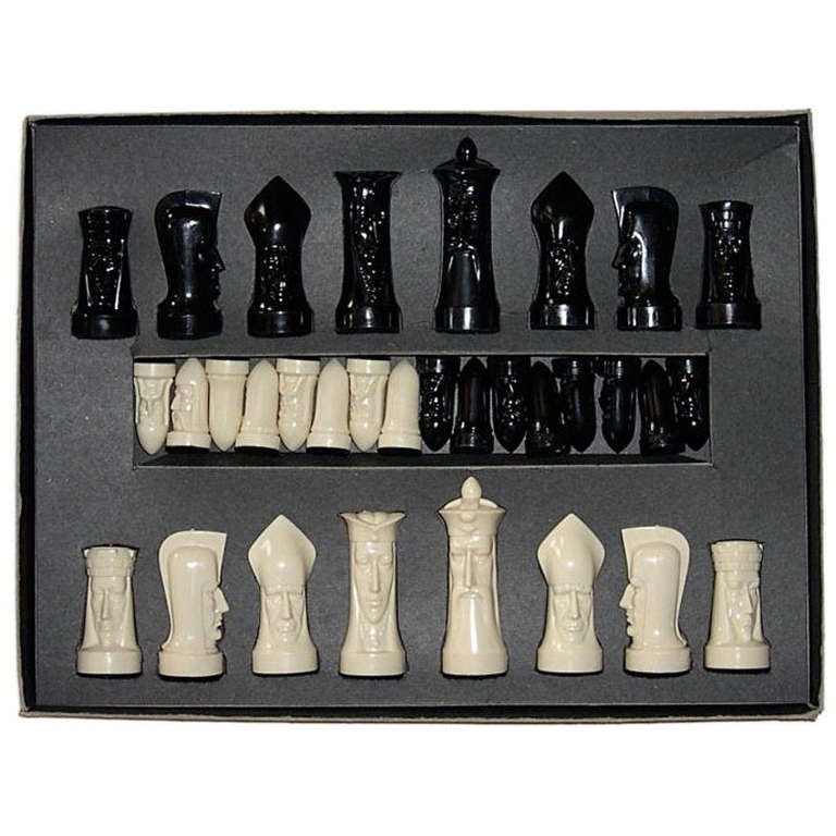This wonderful modern designed chess set comes in it's original box. It was designed by Ganine in 1947 and produced in 1957 by Pacific Game Company of North Hollywood. The set itself is in excellent condition with the box showing minor usage.