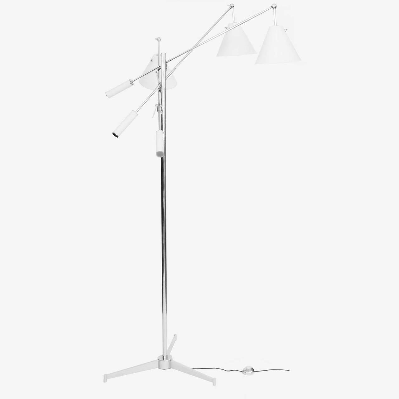 This amazing adjustable floor lamp was designed by Angelo Lelli and produced in 1953. This is a rare all white and chrome version. This lamp even retains its original chrome floor switch. Each cone is stamped Made in Italy, Arredoluce. The lamp is