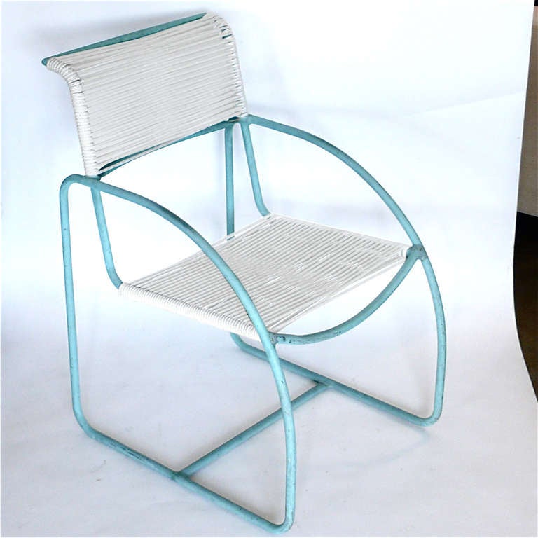 These great dining chairs by Walter Lamb have a beautiful aqua  vintage patina. They have new cotton cording that has been treated for mold and UV resistance.