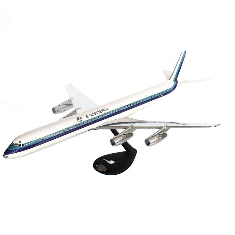 This large and impressive aluminum model of a DC8 is from 1961. it retains it's original base, paint and decals.