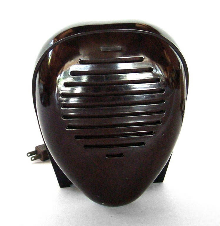This is a great example of the iconic Radio Nurse that Noguchi designed for Zenith Radio Co. of Chicago. Based upon the design of a Samurai Warrior's helmet, the Radio Nurse is a streamline sculpture in bakelite. It is accompanied by it's <br
