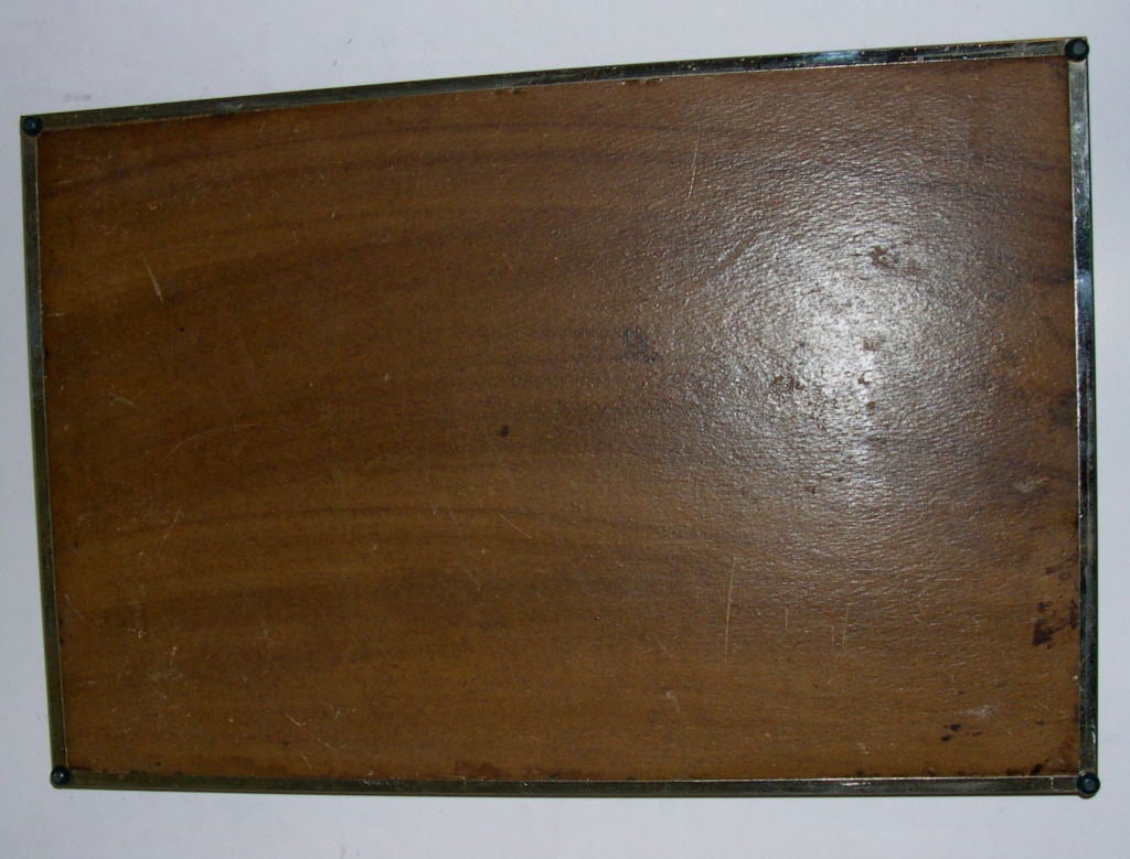 This is the iconic 1930's Jazz Cocktail tray. Pictured in many Art Deco reference books over the years and held in several museum collections, this tray epitomizes the bold graphic designs of the early 1930's. It is made of silkscreened glass with