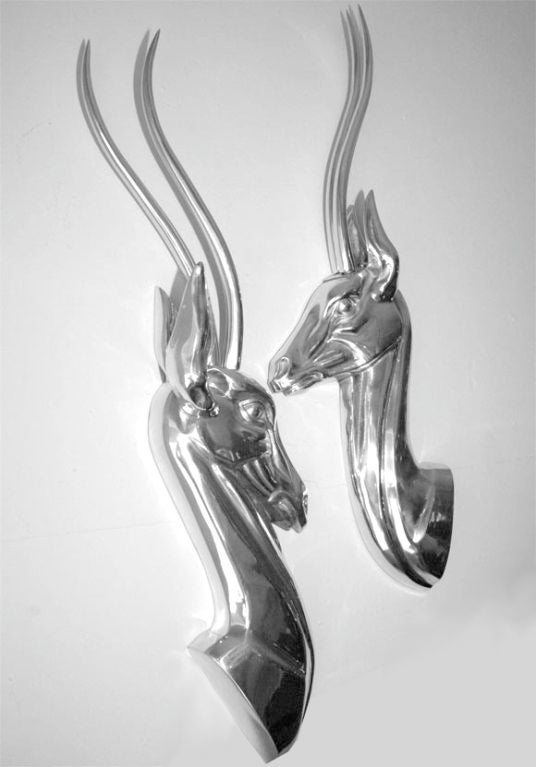 Highly detailed polished aluminum wall sculptures by Pendergrast Products. They look great together or on either side of a mirror or doorway. Built in hooks make them easy to hang.