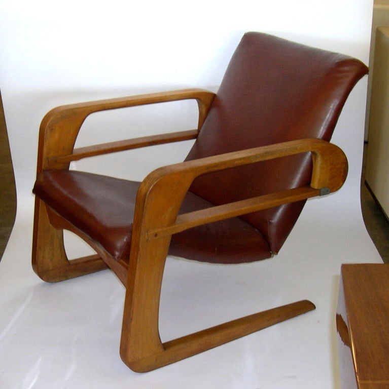 This iconic chair was designed by KEM Weber in 1935. He formed a company, the Airline Chair Compny of Los Angeles to pruduce this chair. Production was very limited and after a commission from Disney Studios, the company ceased to exist.