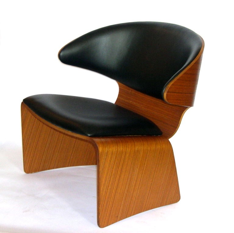 This is a great pair of original Bikini chairs designed by Hans Olsen. They are upholstered in black leather and are surroundef by rich warm teak wood. They are very comfortable with good support. These chairs have the Frem Rojle Made in Denmark