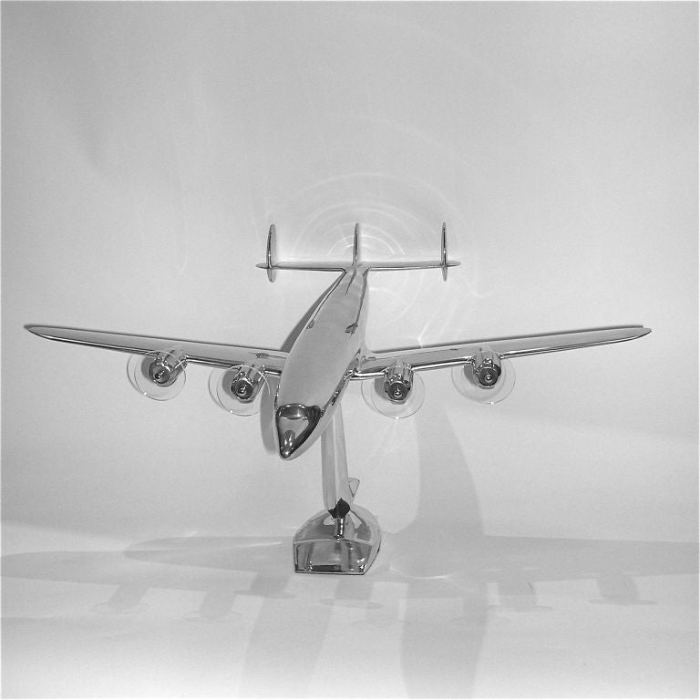 The Constellation is the rarest of all the vintage aluminum airplane models. This is a large scale, impressive Lockheed Constellation cast aluminum model. It has four lucite propellors which simulate the spinning props of the actual plane. These