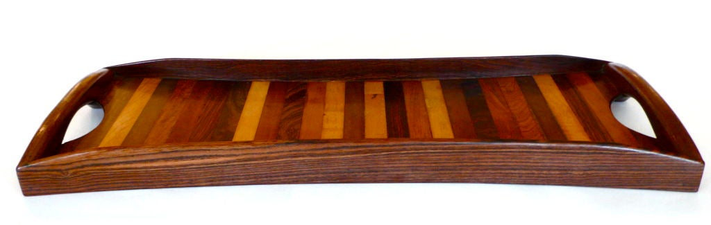 Description: This is an exquisite tray by the renowned Mexican furniture designer, Don Shoemaker. It is in fantastic original condition with a warm rich patina. The handles feel great to hold.