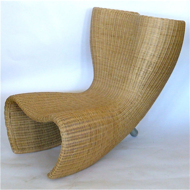 This Marc Newson Wicker chair has a wonderful organic sculptural design. The use of wicker further enhances the organic qualities of this design. It is surprisingly comfortable and has good weight although it appears light as a feather.