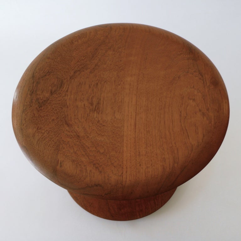 This is a beautiful example of an original low Noguchi rocking stool. The wood has a beautiful warm patina. It retains it's original Knoll label.
