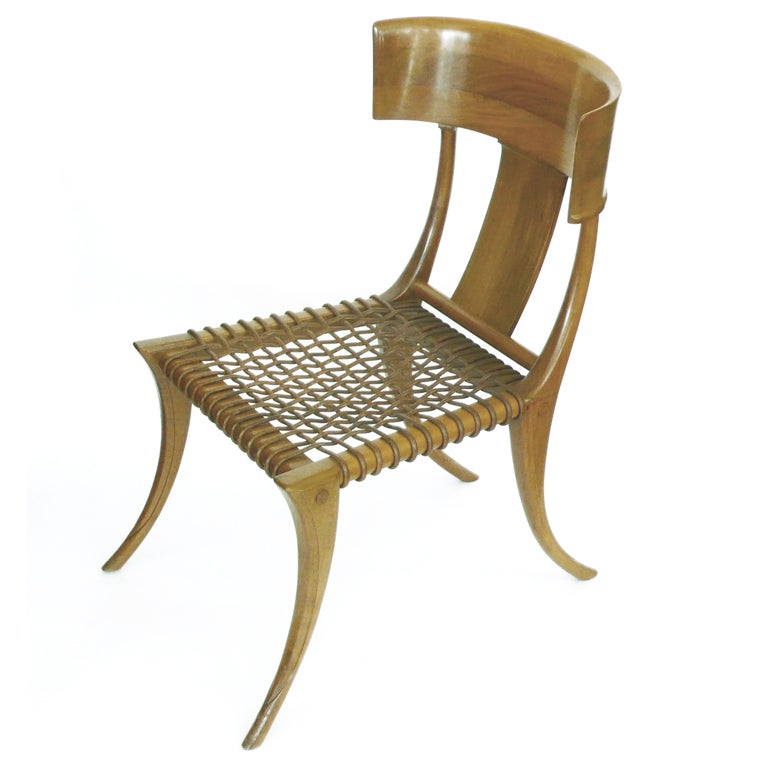 This design for these chairs is a true form of sculpture with beautiful carving details on the legs.   Yet they are  quite comfortable. It is the 1st issue of these chairs from 1961 produced in Greek walnut by Sardis of Athens. It is completely