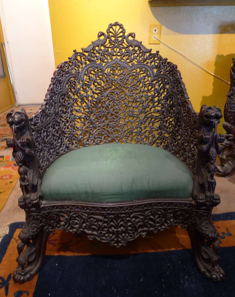 Lavishly hand-carved late-1800s Burmese chair.