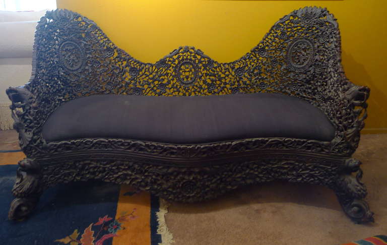 Greatly detailed hand-carved late-1800s Burmese settee..